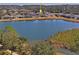 Aerial view of house next to a lake at 5149 Jennings Trl, Brooksville, FL 34601