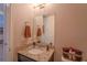 Cozy bathroom features a granite countertop and decorative accessories at 5149 Jennings Trl, Brooksville, FL 34601