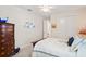 Bright bedroom with double bed and large dresser at 5149 Jennings Trl, Brooksville, FL 34601