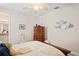 Bedroom with dresser and ceiling fan at 5149 Jennings Trl, Brooksville, FL 34601