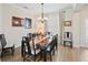 Formal dining room with hardwood floors and chandelier at 5149 Jennings Trl, Brooksville, FL 34601