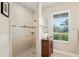 Large walk-in shower with tile surround and bench at 5149 Jennings Trl, Brooksville, FL 34601