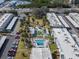 Aerial view of the complex, highlighting the pool and green spaces at 5267 81St N St # 12, St Petersburg, FL 33709