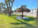 Relaxing outdoor space with shaded seating near the pool at 5267 81St N St # 12, St Petersburg, FL 33709