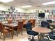 Community library with ample seating and a wide selection of books at 5267 81St N St # 12, St Petersburg, FL 33709