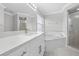 Elegant bathroom with soaking tub, white vanity, and walk-in shower at 6119 Freeport Dr, Spring Hill, FL 34606