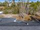 Dark gray architectural shingles on the house roof at 6119 Freeport Dr, Spring Hill, FL 34606