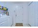 Laundry room with washer, dryer and storage at 6932 Oakcrest Way, Zephyrhills, FL 33542