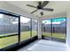 Screened porch overlooking backyard at 6932 Oakcrest Way, Zephyrhills, FL 33542