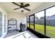 Cozy screened porch with grilling area at 6932 Oakcrest Way, Zephyrhills, FL 33542