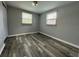 Spacious bedroom featuring wood-look floors at 6985 82Nd N Ave, Pinellas Park, FL 33781