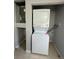 Stackable washer and dryer in laundry closet at 6985 82Nd N Ave, Pinellas Park, FL 33781