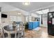 Rustic dining table with chairs near kitchen and living room at 7051 Nova Scotia Dr, Port Richey, FL 34668