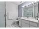 Bathroom with a shower, toilet and vanity at 7304 Gates Cir, Spring Hill, FL 34606