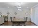 Elegant dining room with a large table, and stylish lighting at 7304 Gates Cir, Spring Hill, FL 34606