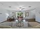 Bright living room with hardwood floors, fireplace and comfortable seating at 7304 Gates Cir, Spring Hill, FL 34606