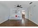 Living room with a couch and view into dining area at 7304 Gates Cir, Spring Hill, FL 34606