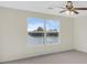 Bedroom with lake view and ceiling fan at 8243 47Th Street E Cir, Palmetto, FL 34221