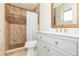 Bathroom with a shower, toilet, and vanity at 8310 Archwood Cir, Tampa, FL 33615