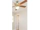 Bedroom with ceiling fan and access to hallway at 8310 Archwood Cir, Tampa, FL 33615