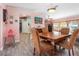 Casual dining area with wood table and chairs near the kitchen at 8460 Parkwood Blvd, Seminole, FL 33777