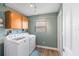 Bright laundry room with washer and dryer at 8460 Parkwood Blvd, Seminole, FL 33777