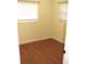 Bright bedroom with wood-look flooring at 925 67Th S St, St Petersburg, FL 33707