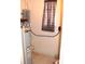 Laundry room with water heater and shelving at 925 67Th S St, St Petersburg, FL 33707