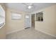 Bright room features tile floors and an open pass-through to the kitchen at 925 67Th S St, St Petersburg, FL 33707