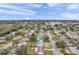 Aerial showing neighborhood, homes, and landscape at 9850 55Th N Way, Pinellas Park, FL 33782