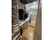 Large walk-in closet with shelving, drawers and hanging space at 15906 Country Farm Pl, Tampa, FL 33624