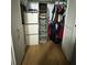 Well-organized walk-in closet with shelving and drawers at 15906 Country Farm Pl, Tampa, FL 33624
