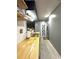 Modern kitchen with light wood countertops and gray cabinets at 15906 Country Farm Pl, Tampa, FL 33624