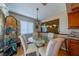 Cozy dining area features decorative accents and large windows that provide great natural lighting at 1723 Wolf Laurel Dr, Sun City Center, FL 33573