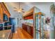 Open concept kitchen features updated stainless appliances and granite countertops and adjacent breakfast area at 1723 Wolf Laurel Dr, Sun City Center, FL 33573