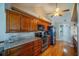 Modern kitchen boasts stainless steel appliances, ample storage, and granite countertops with lots of light at 1723 Wolf Laurel Dr, Sun City Center, FL 33573