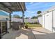 Enjoy grilling and relaxing in the backyard with a pergola and nice view at 1761 Eaton Ne Dr, Clearwater, FL 33756