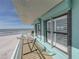 Peaceful balcony with hammock and ocean view at 19440 Gulf Blvd # 301, Indian Rocks Beach, FL 33785