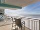 Beachfront balcony with patio furniture offering stunning ocean views at 19440 Gulf Blvd # 301, Indian Rocks Beach, FL 33785