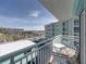 Balcony view overlooking street and neighboring buildings at 19440 Gulf Blvd # 301, Indian Rocks Beach, FL 33785