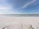 Expansive beach view with white sand and ocean at 19440 Gulf Blvd # 301, Indian Rocks Beach, FL 33785