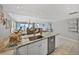 Kitchen with island and ocean views at 19440 Gulf Blvd # 301, Indian Rocks Beach, FL 33785