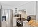 Modern kitchen with stainless steel appliances at 19440 Gulf Blvd # 301, Indian Rocks Beach, FL 33785