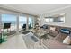 Spacious living room with ocean view and comfy seating at 19440 Gulf Blvd # 301, Indian Rocks Beach, FL 33785