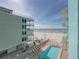 Inviting community pool with ocean view at 19440 Gulf Blvd # 301, Indian Rocks Beach, FL 33785