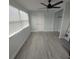Bright bedroom with ceiling fan and double door closet at 2048 Tumbleweed Dr, Holiday, FL 34690