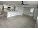 Open concept kitchen with island and stainless steel appliances at 2048 Tumbleweed Dr, Holiday, FL 34690
