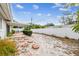 Large backyard with covered patio and landscaped areas at 2124 16Th Sw Ave, Largo, FL 33770