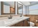 Bathroom with double vanity, large mirrors and shower at 2124 16Th Sw Ave, Largo, FL 33770