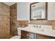 Updated bathroom with a vanity, quartz countertop and a shower at 2124 16Th Sw Ave, Largo, FL 33770